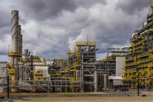 Oil Refinery factory at the cloudy sky, petrochemical plant, Petroleum